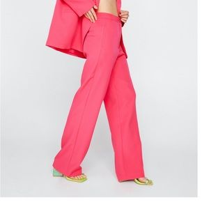 Nasty Gal Bright Pink trousers. NWT sold out online. Size medium.